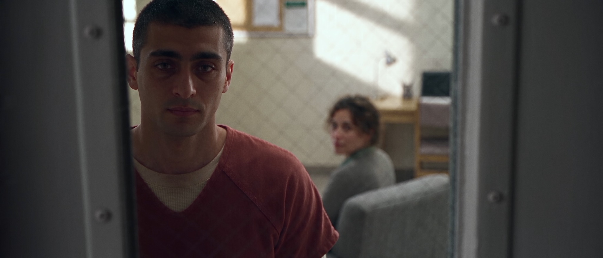 Noah in prison with Talia in the visiting room